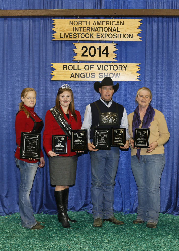 Numerous awards were given to these individuals at the 2014 North American International Livestock Exposition (NAILE) Super Point Roll of Victory (ROV) Angus Show, Nov. 18 in Louisville, Ky. Pictured from left are Katy Satree, Miss American Angus Maddi Butler, and Doug and Jane Satree. Doug Satree Angus, Montague, Texas, won reserve junior bull calf champion of the year and reserve senior champion bull of the year with DAJS After Burn 714; and senior bull calf of the year with DAJS Rebound 630; Katy Satree, Montague, Texas, won dam of the year with DAJS Joyce 77; Little Cedar Cattle Co., Beaverton, Mich., won reserve dam of the year with L C C C Lucy 131; and Haley Herzog, Robinson, Texas, won reserve junior heifer calf champion of the year with DAJS Sally 928. Photo by Carrie Heitman, Angus Media.